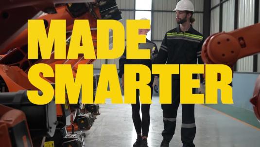 Graphic promoting funding support for manufacturers through Made Smarter South West. Text highlights funding to improve efficiency, with an image of a factory setting and industrial machinery. Partner organisation logos are displayed beneath the main message.